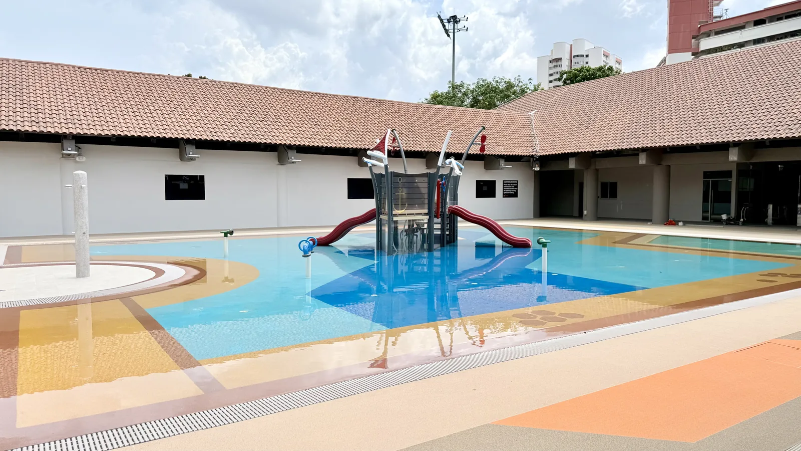Hougang's children's wading pool with slides and fountains